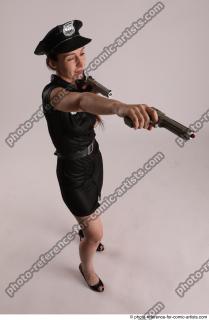 10 NIKITA POLICEWOMAN STANDING POSE WITH TWO GUNS